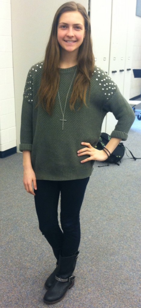 forest green sweater with studded boots and cross necklace